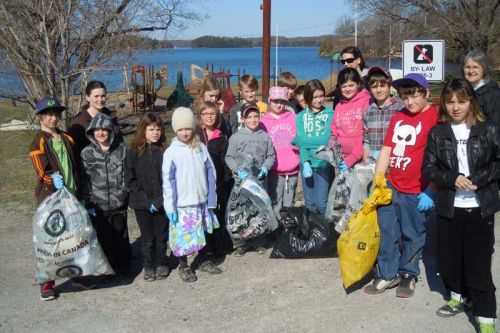 Students, staff and volunteers from Sharbot Lake Public school pitch in in a village-wide community clean up for Earth Day